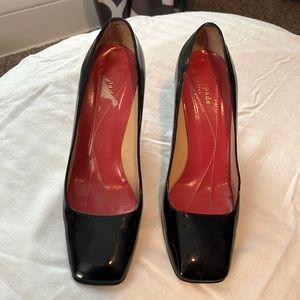 Very stylish Kate Spade black square toe heels. Patten leather.
